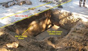 The second hole, on the south side of the wall, showing nineteenth-century stone repairs and a late 20th century utility obstruction.